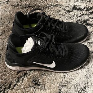 Nike Black Athletic Sneakers with White Swoosh